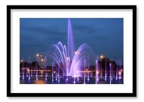 The illuminated fountain at night