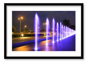 The illuminated fountain at night