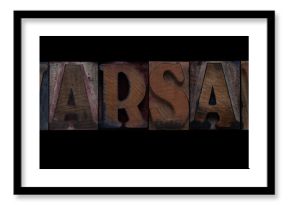 the word Warsaw in old letterpress wood type