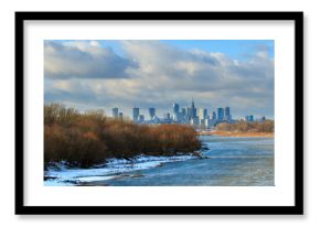 Warsaw sky line with skyscrapers of city center, Vistula river shore in winter