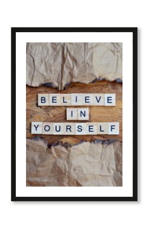 believe in yourself text on wooden square, motivation quotes