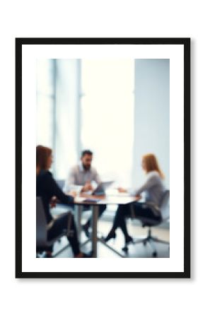 Defocused abstract background featuring a modern meeting room with natural light and a professional