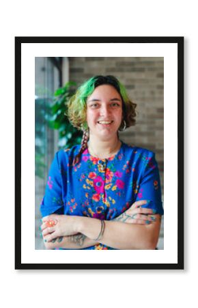 Young female entrepreneur smiling in the office 