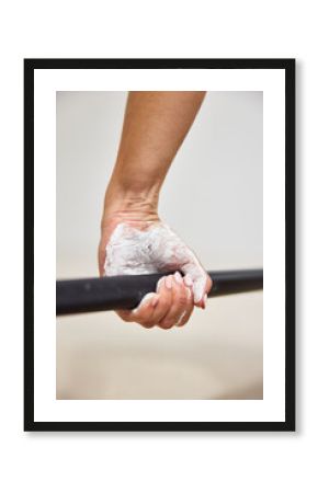 Grip technique on a weightlifting bar during training session