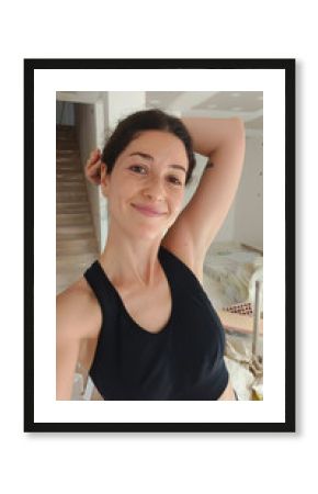 UGC selfie of Woman Smiling in a Home Renovation Project