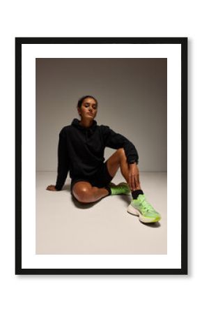 Female athlete resting on floor