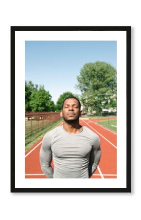 Portrait of sportsman with closed eyes