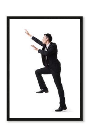 Asian businessman climbing