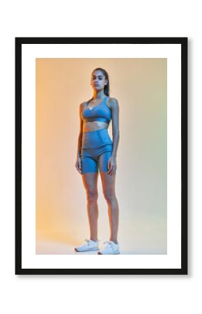 Confident sportswoman looking at camera