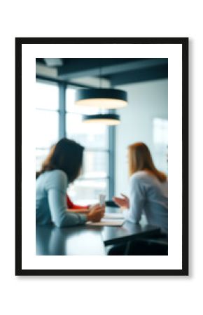 Defocused abstract background featuring a modern meeting room with natural light and a professional