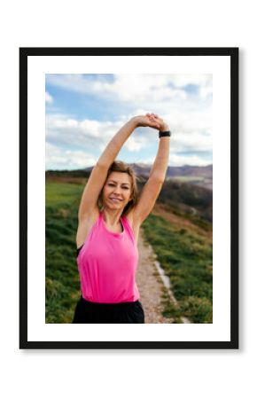 Woman stretching arms