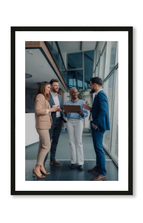 Business people discussing work in modern office building