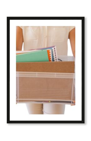 Fired businesswoman holding box of her things