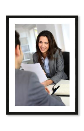 Businesswoman giving job interview