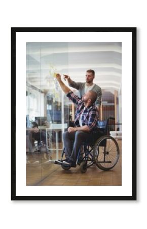 Handicap businessman  sticking adhesive notes 
