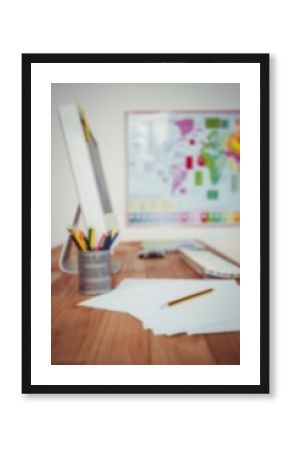 Papers by desktop pc on desk