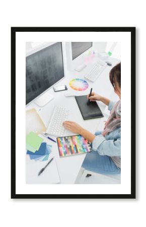 Artist drawing something on graphic tablet