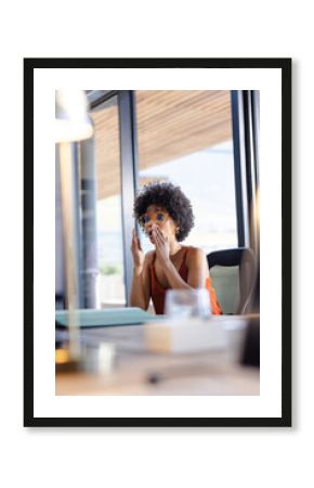 woman in office surprised by unexpected news during work meeting, copy space