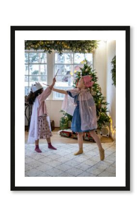 Two cute, little girls playing  princesses 