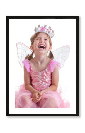A laughing young girl dressed as a fairy princess, isolated on white