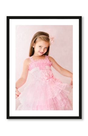 Portrait of smiling little girl in princess dress