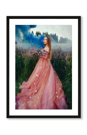 Beautiful model is emotionally posing with flowers