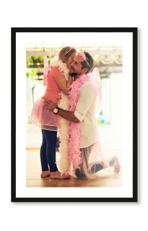 Secret, whispering or dad in home with girl princess speaking of pink costume, playing or parent. Family, private conversation or father with child for dress up, gossip news or games with fairy wings