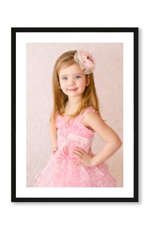 Portrait of smiling little girl in princess dress