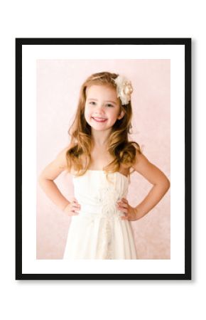 Happy adorable little girl in princess dress