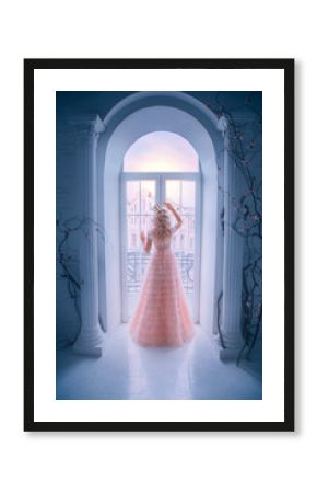 Sad princess looking window staying home. Queen lady enjoy evening sunset. concept freedom. long blonde hair. Pink vintage full dress white classic interior room. Silhouette woman turned away back 