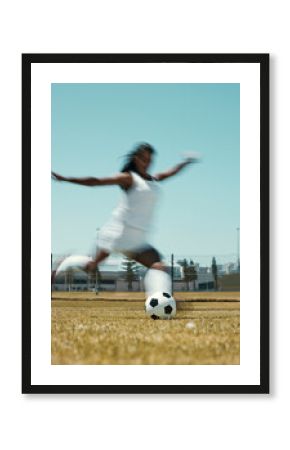 Motion blur soccer woman kick ball on stadium field, grass and sports competition game to score goals, winning and fitness. Female football athlete action, energy and dynamic shot in outdoor training