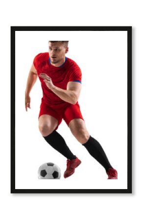 Young man in red uniform, professional football player in motion training, dribbling ball isolated over transparent background. Concept of sport, competition, action and motion, lifestyle