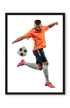 Young man, professional football player in motion, training, playing isolated over transparent background. Ball dribbling. Concept of sport, competition, action and motion, lifestyle