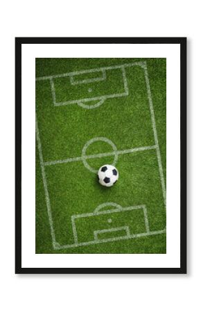 Green grass texture with a soccer ball as a tactical poster. Soccer strategy with copy space.