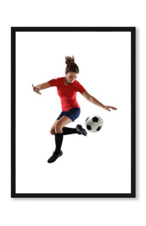 Female Soccer Player Kicking Ball