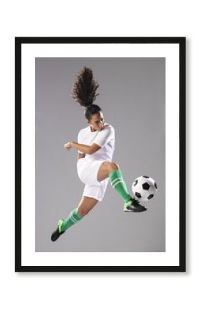 Full shot football kicking ball