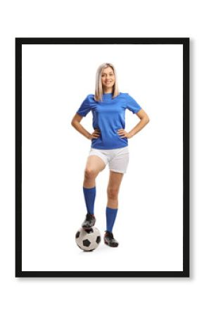Full length portrait of a female football player posing with a soccer ball
