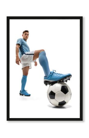 Stylish dynamic zoom pose of a soccer player with his foot on ball on isolated background