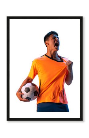 Man, soccer player in bright uniform shouting with ball during game isolated on transparent background