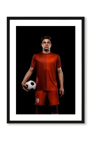 Teenager - soccer player. Boy in football sportswear after game with ball. Sport concept.