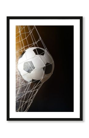 soccer ball in goal with spotlight