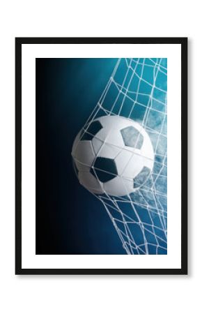 soccer ball in goal with spotlight