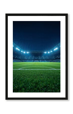 Illuminated soccer stadium field at night