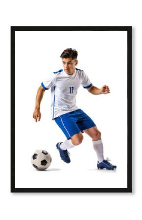 Football athlete in motion with focus control on soccer ball, isolated background