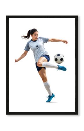 Pro female soccer player doing a midair ball control with her leg on isolated background