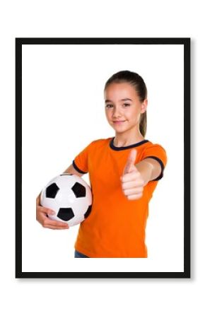 Young girl in orange shirt holding soccer ball and giving thumbs up isolated on white background