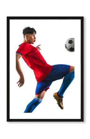 Kicking ball with knee. One young Caucasian soccer football player training against transparent background. Championship buildup. Concept of championship, match, action, team sport game, energy.