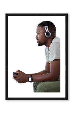 Man playing video game against white background