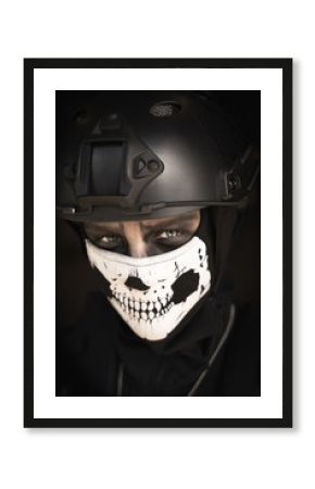 A female cosplayer dressed as a bad soldier character