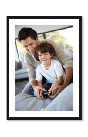 Daddy with kid playing video game